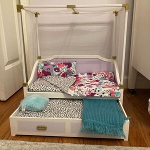 Doll Canopy Bed with Floral and Polka Dot Bedding